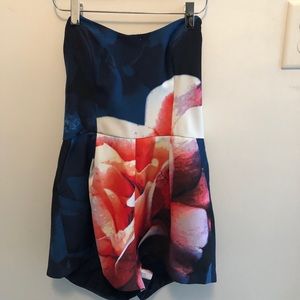 NWT Navy rose print romper SIZE M.